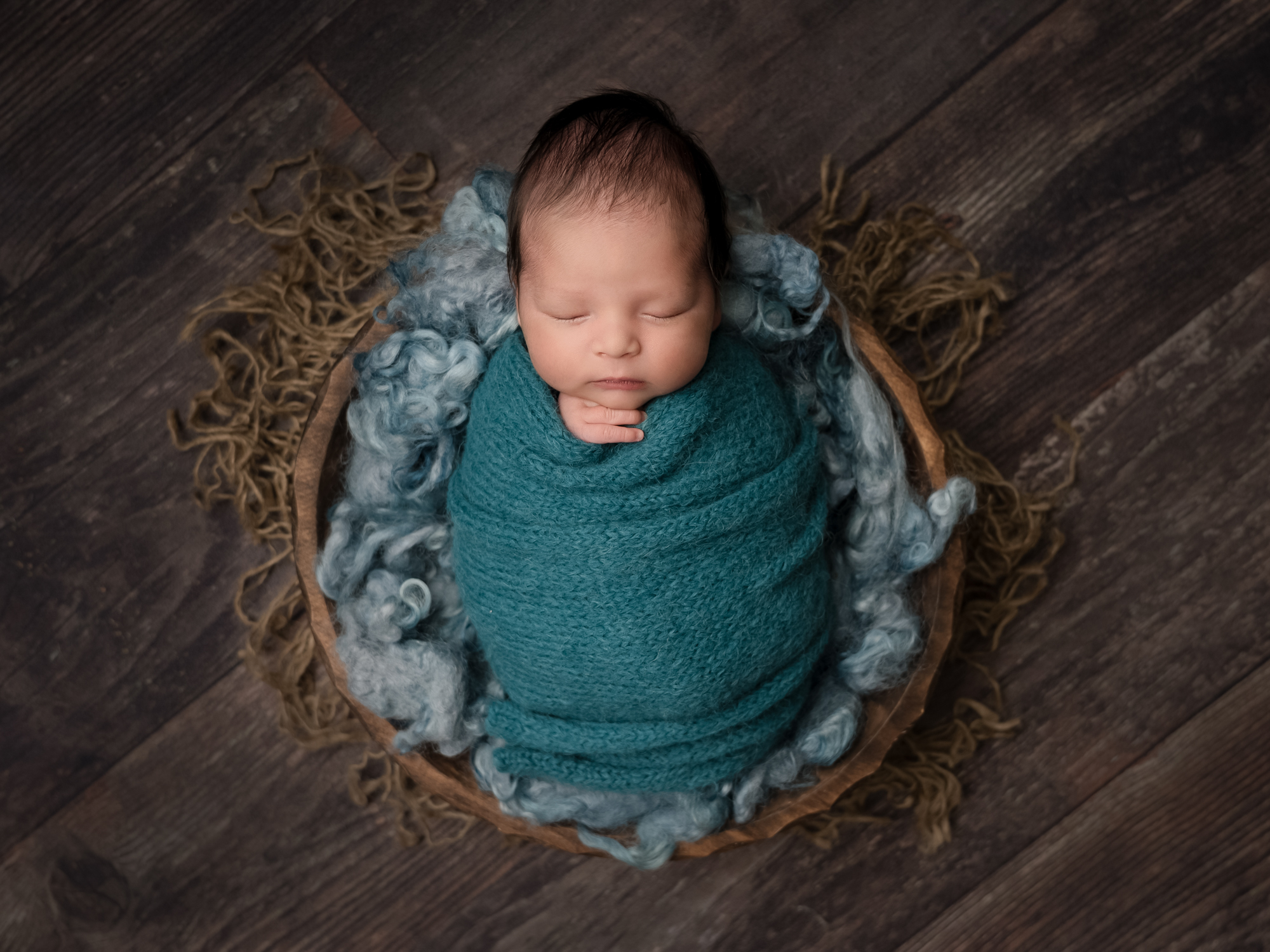 Wrapped up Newborn Photography done by Hayley Scott