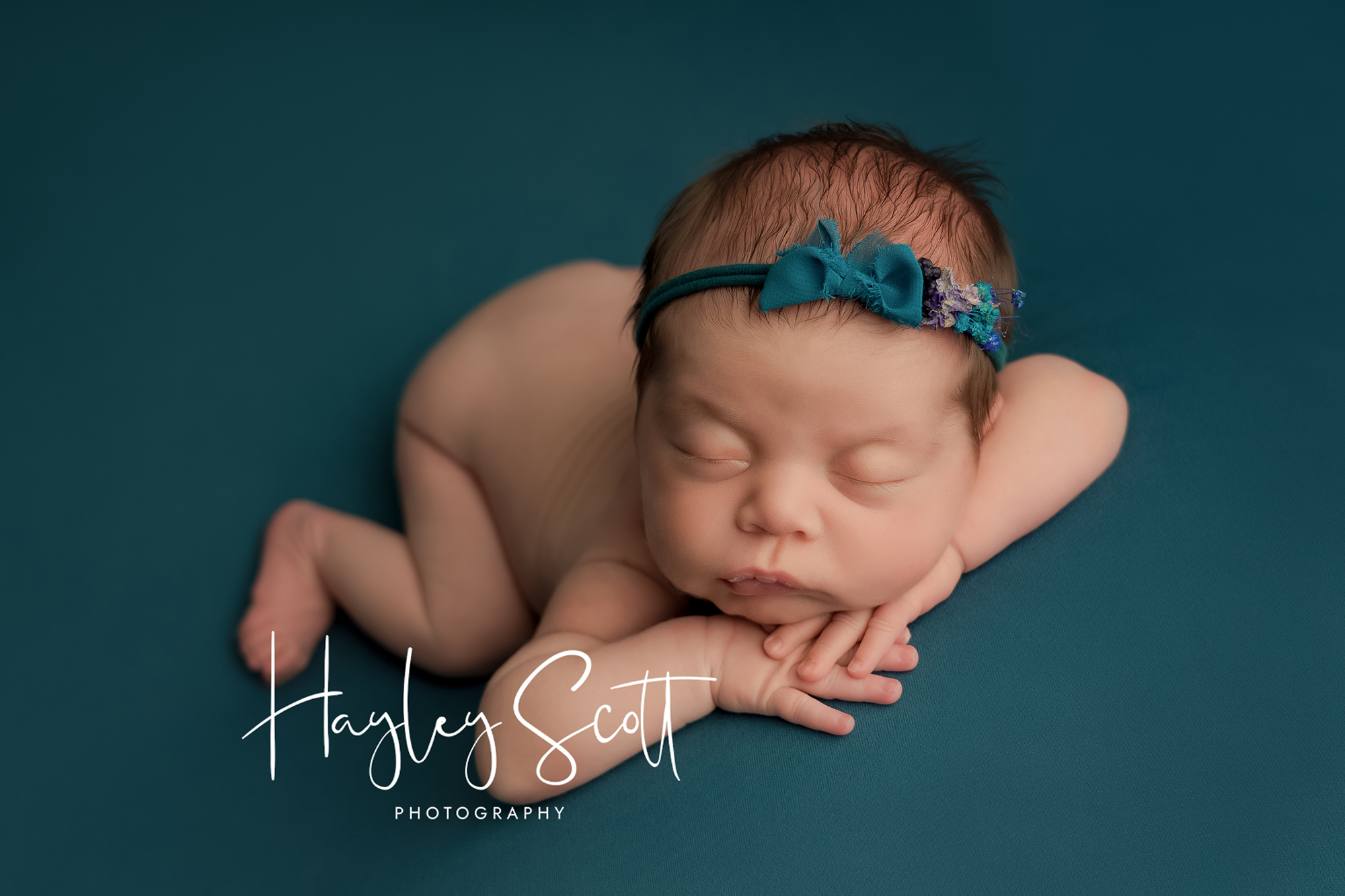 Rustic style Newborn Baby Photography holding teddy bear